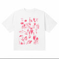 White oversized tee with pink hand-drawn illustration collage